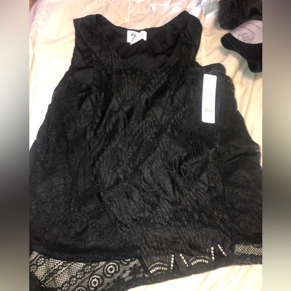 Andrea Jovine woman too small lacy outside and with a under slip no see through